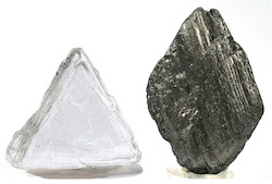 An uncut diamond (left) compared to a piece of uncut graphite (right)