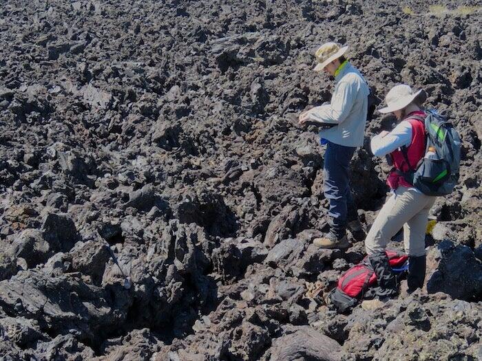 Researchers in a lava field at the Craters of the Moon, Idaho, United States.